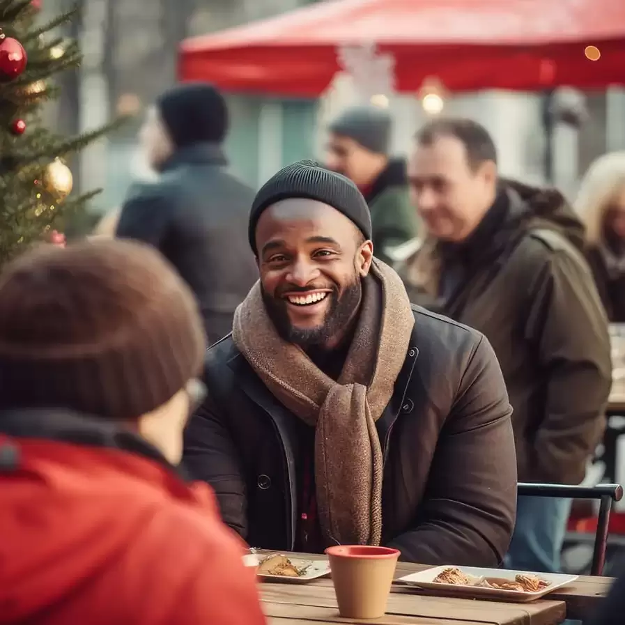 african-american-man-sitting-outside-bar